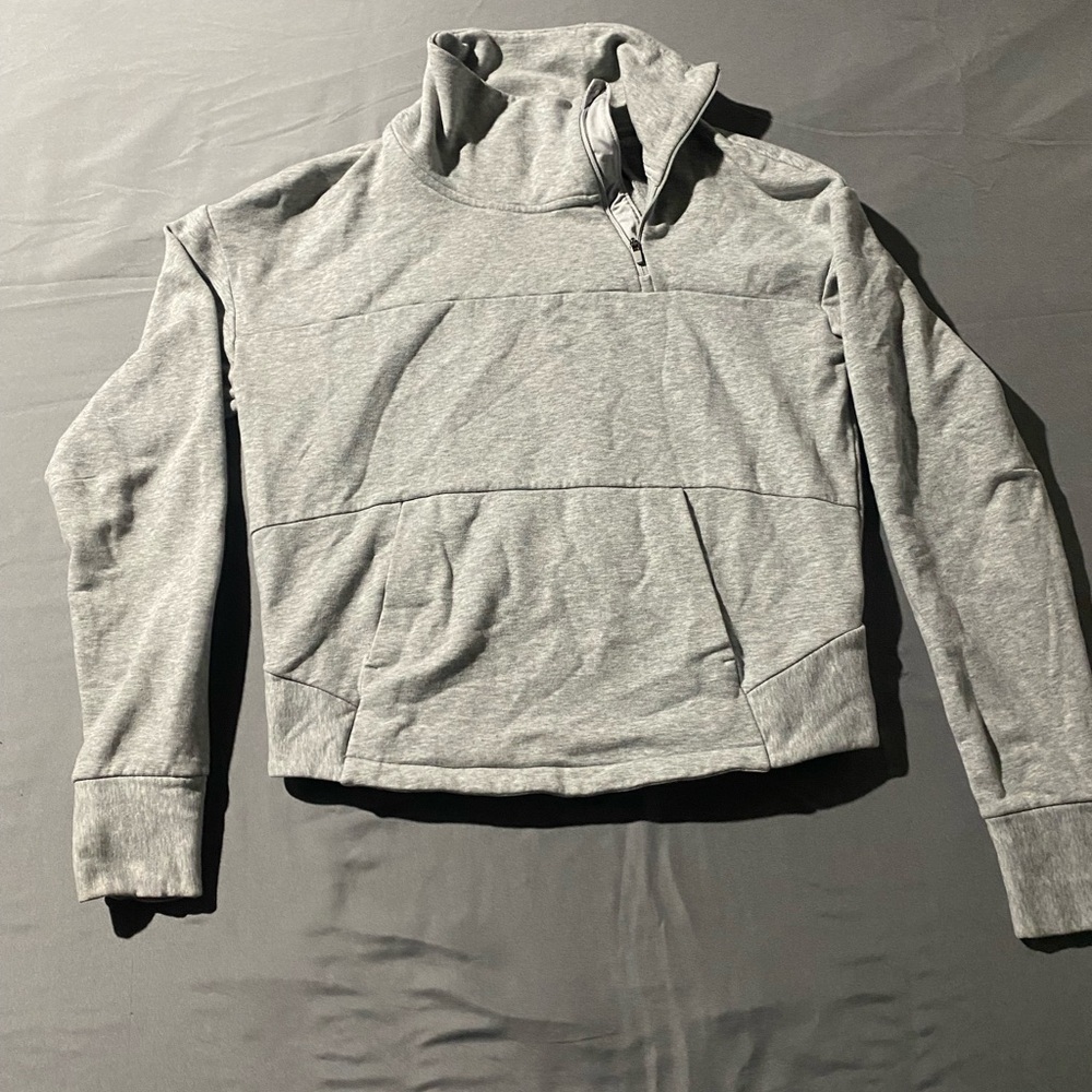 The North Face women’s grey pull over sweater with zip up turtle neck